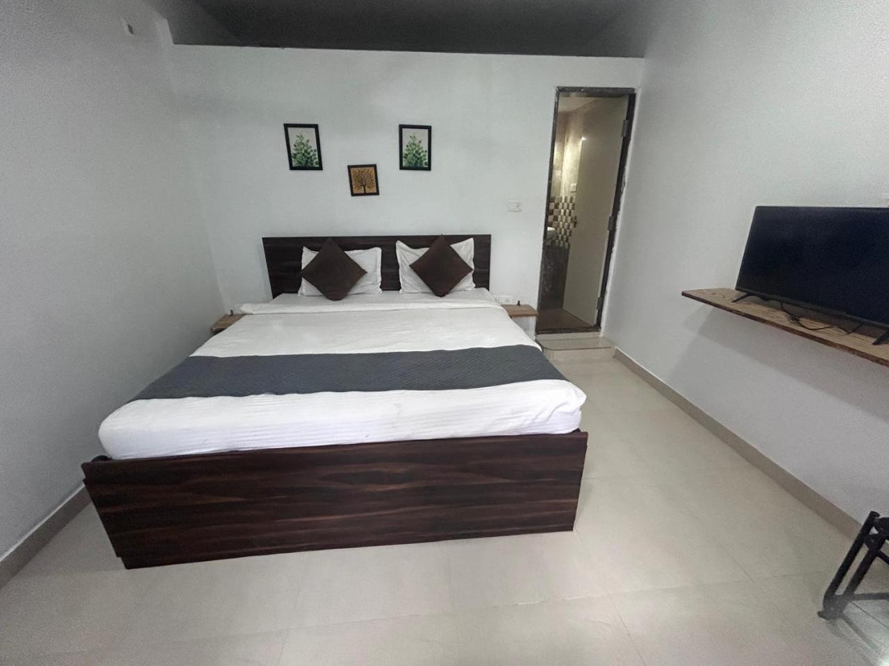 Hotel Baga Place Extérieur photo